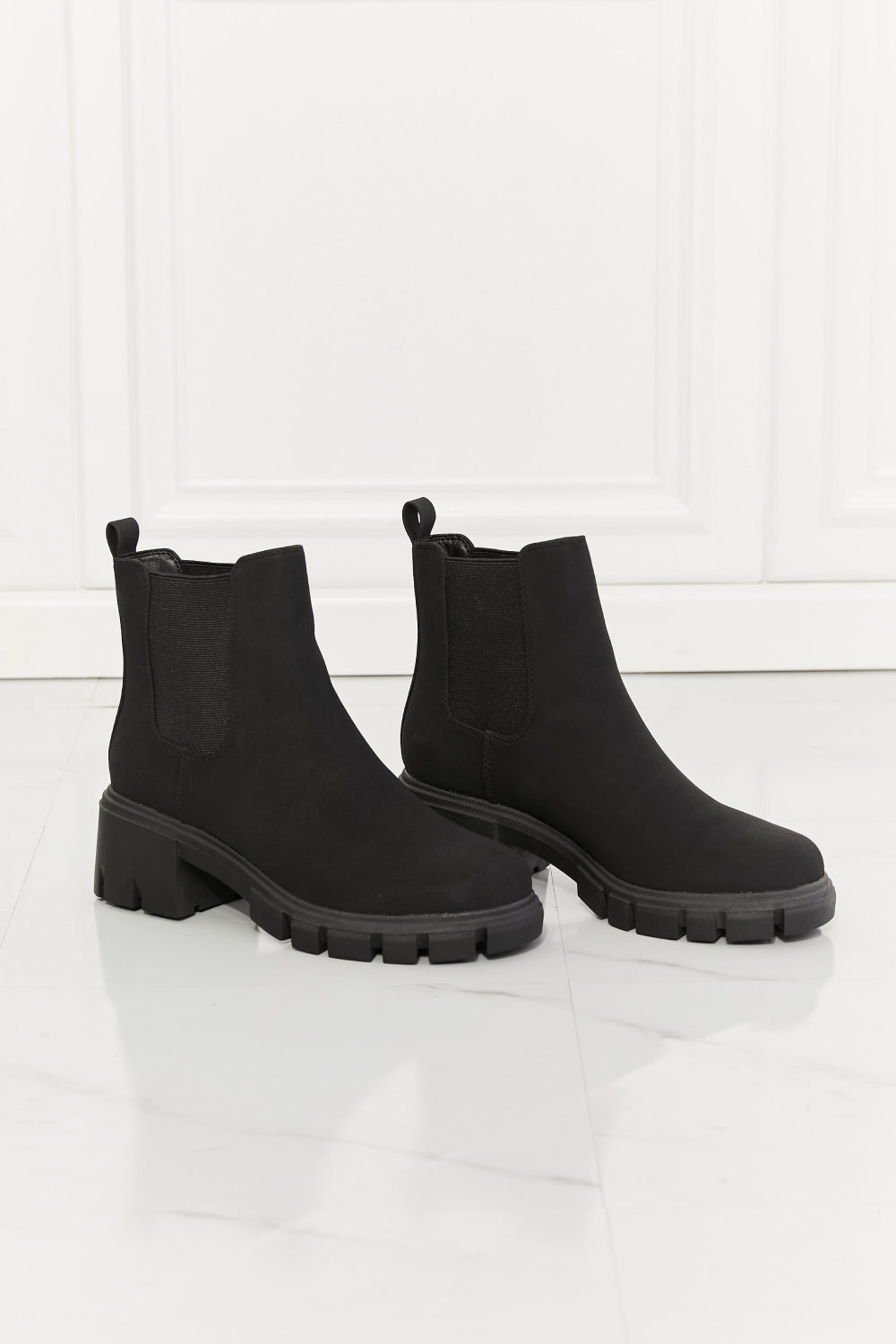 Lug Sole Chelsea Boots in Black