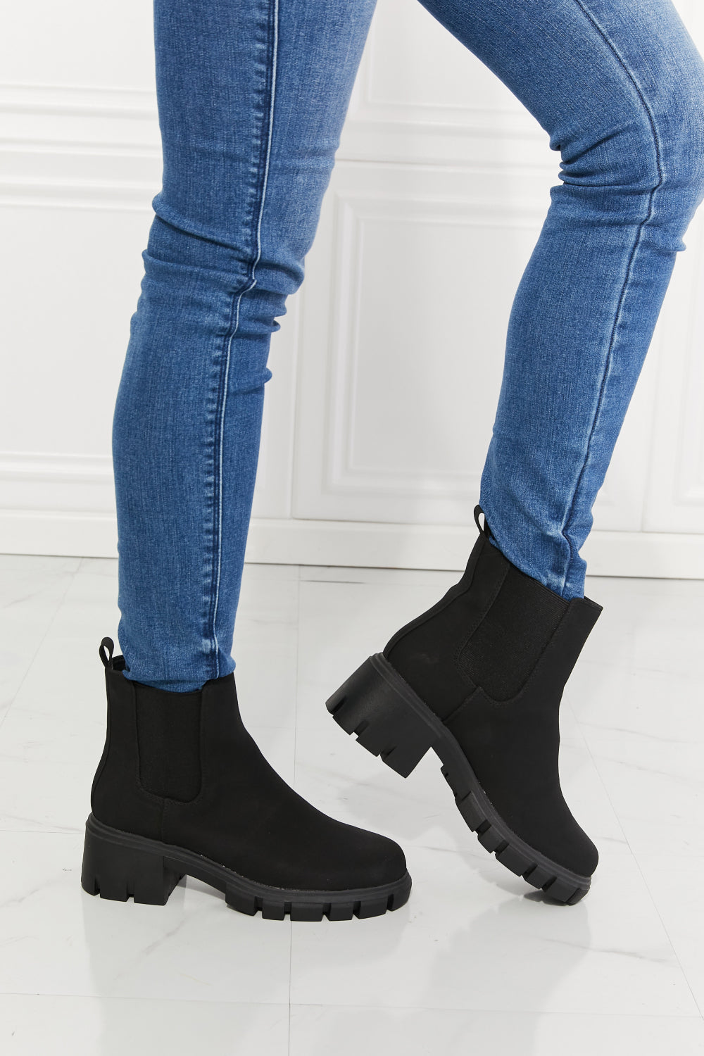 Lug Sole Chelsea Boots in Black