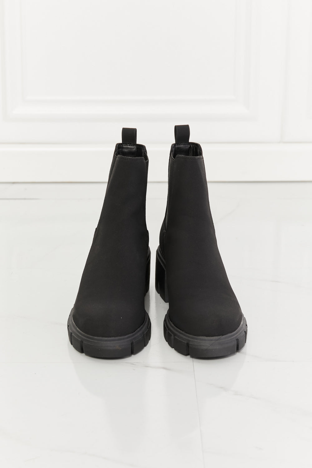 Lug Sole Chelsea Boots in Black